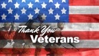 Thank You Veterans. U.S. soldiers are running across an American flag background.